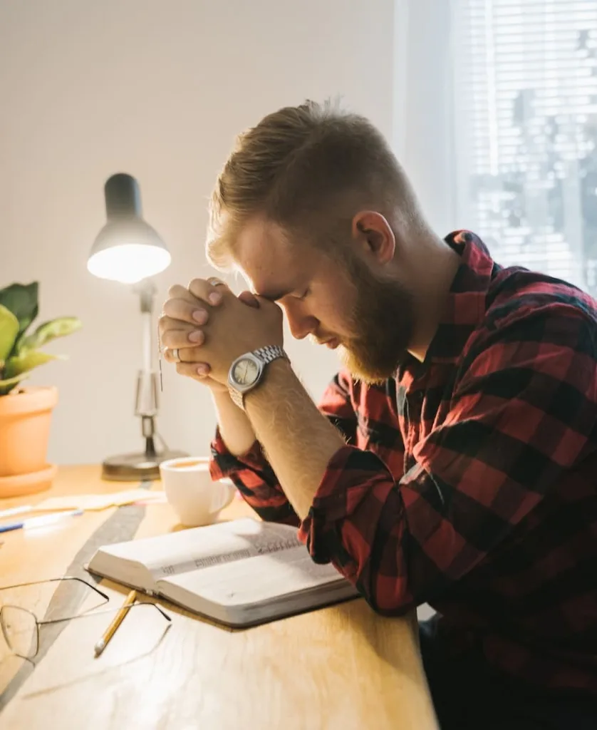 man praying to god