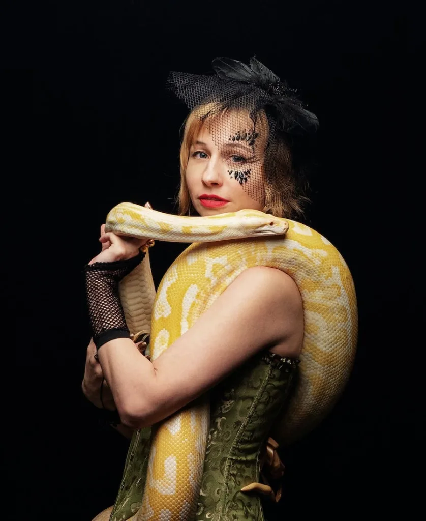 Woman with anaconda