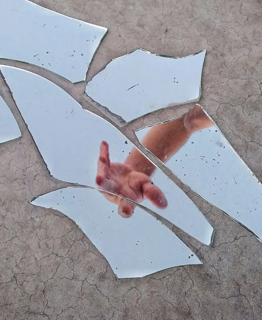 a broken glass on the floor