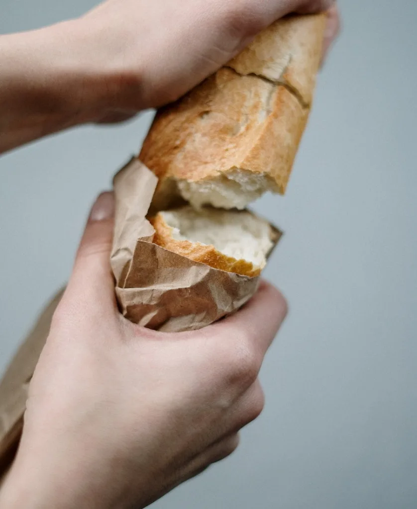 someone sharing bread