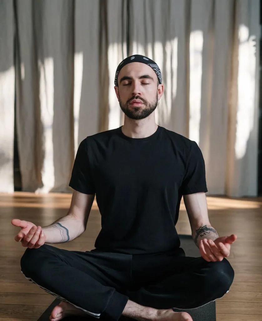 a man sleeping while doing meditation