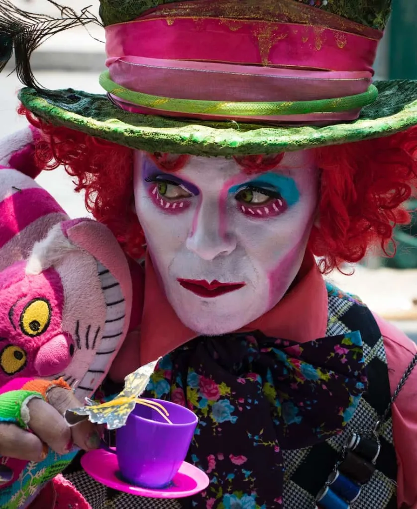 mad hatter holding a cup of tea