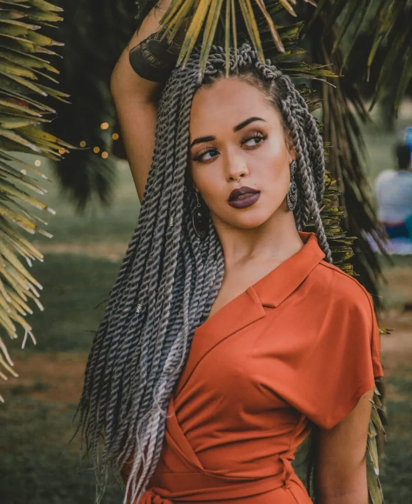 Young woman with long braids