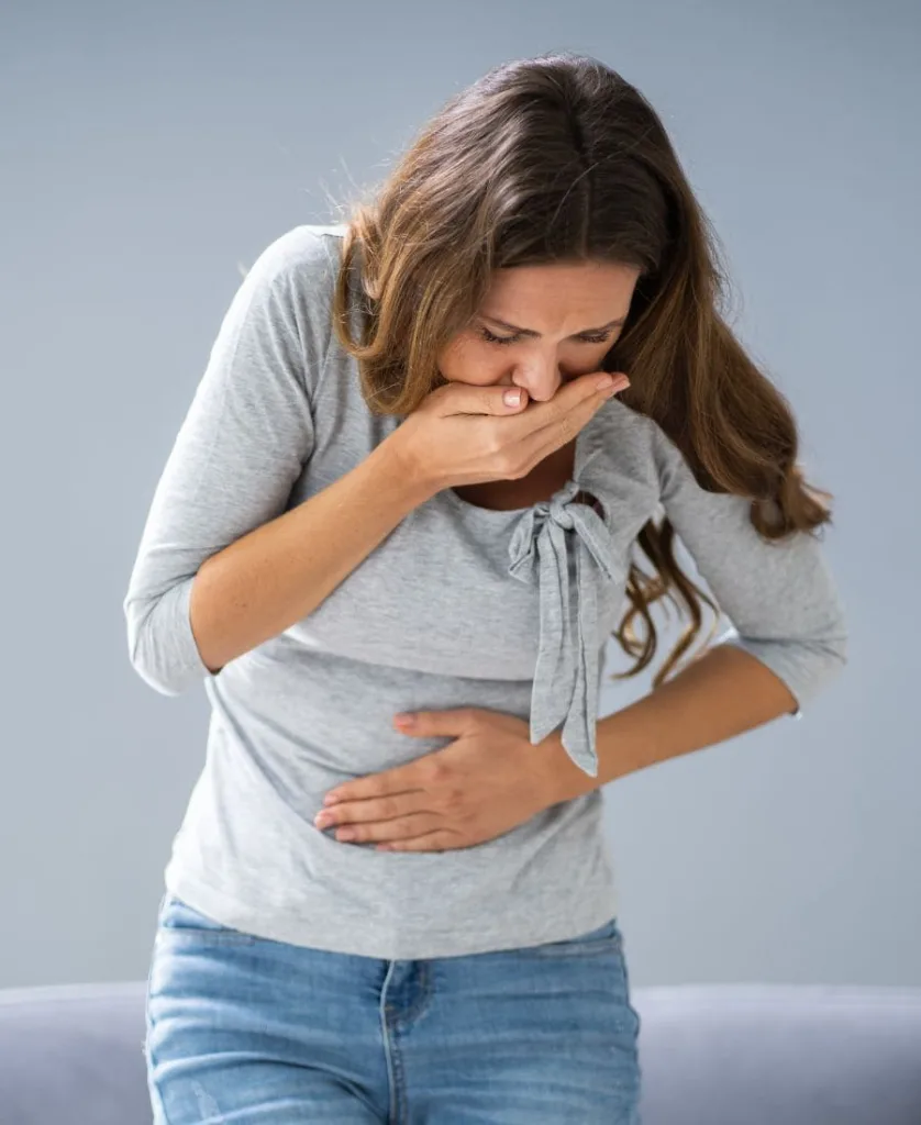 Woman Vomiting